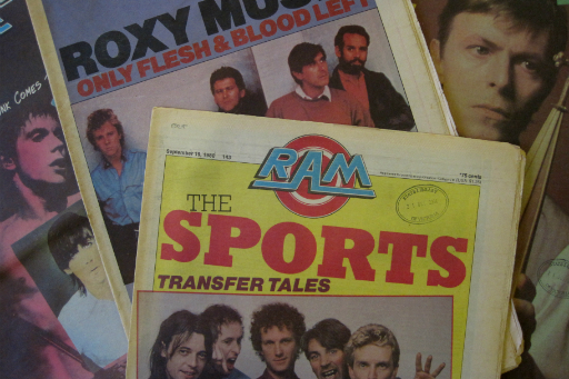 Detail of magazine covers with Sports, Roxy Music and photos of the groups and David Bowie
