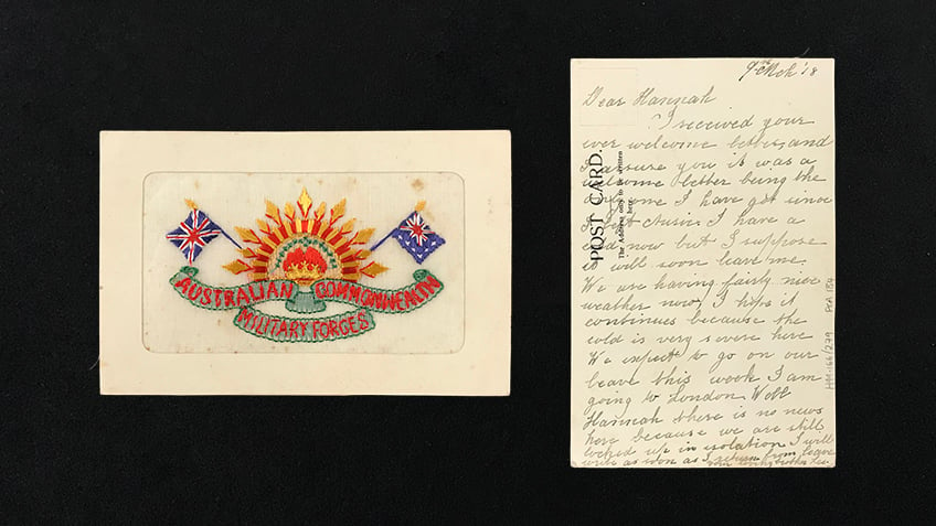 Embroidered front of postcard and handwritten back of same postcard
