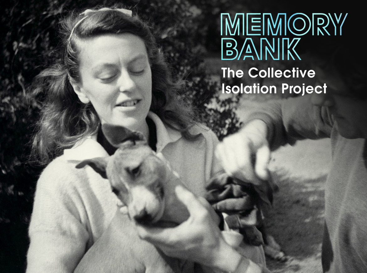 A young woman looks fondly at the dog she's holding