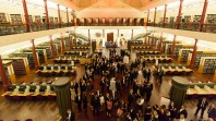 People in formal dress in Redmond Barry Reading Room