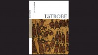 black background with journal cover with Aboriginal artwork