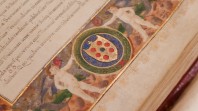 A close up of the colourful borders of a large book