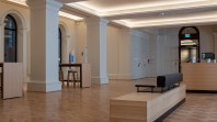 empty public hall with seating and tables