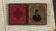 Antique hinged photographic case reveals B&W photo of a 19th-century US naval officer