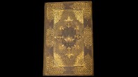 colour photo of leather and gilt historical volume Collected writings of King James I with personalised binding for Prince Charles, London, 1616