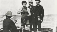 Harry Houdini on a boat in the Yarra River, WG Alma Conjuring Collection