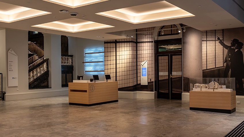 foyer with doors to library