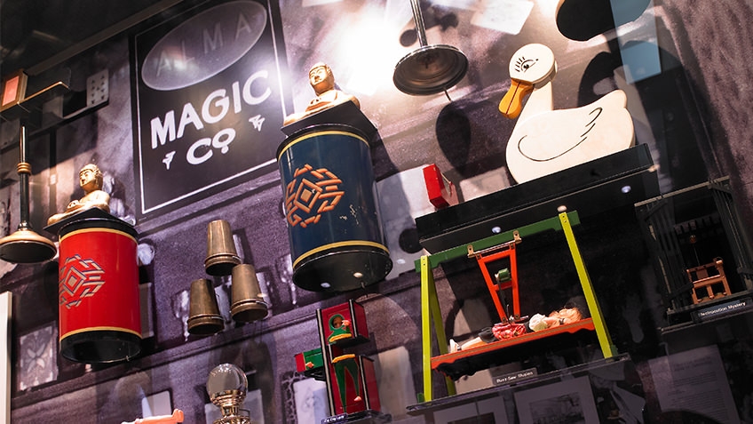 Photo of items from the Alma magic collection in a gallery display