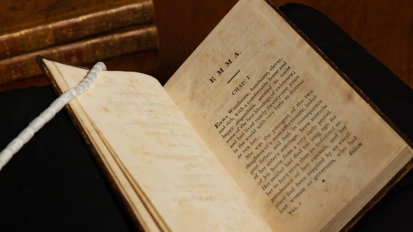 A copy of Jane Austen's Emma, open to Chapter 1