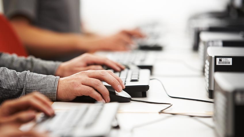 People using computers - keyboards and mouse