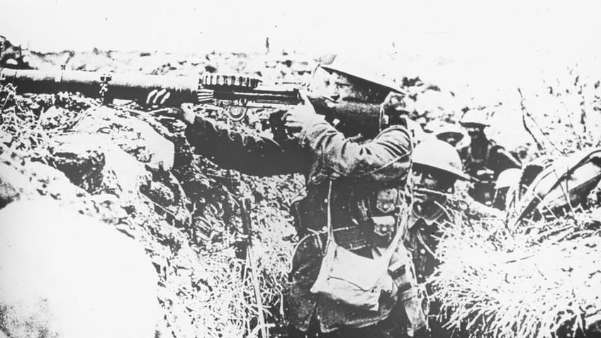 Soldier in trench firing Lewis gun, 1915