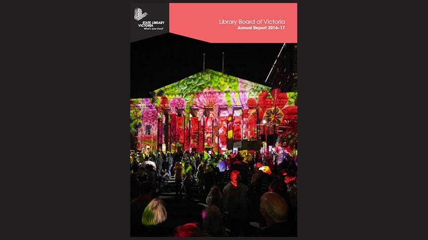 Colour cover of annual report showing front facade of Library with floral light projections on it and a crowd in the foreground