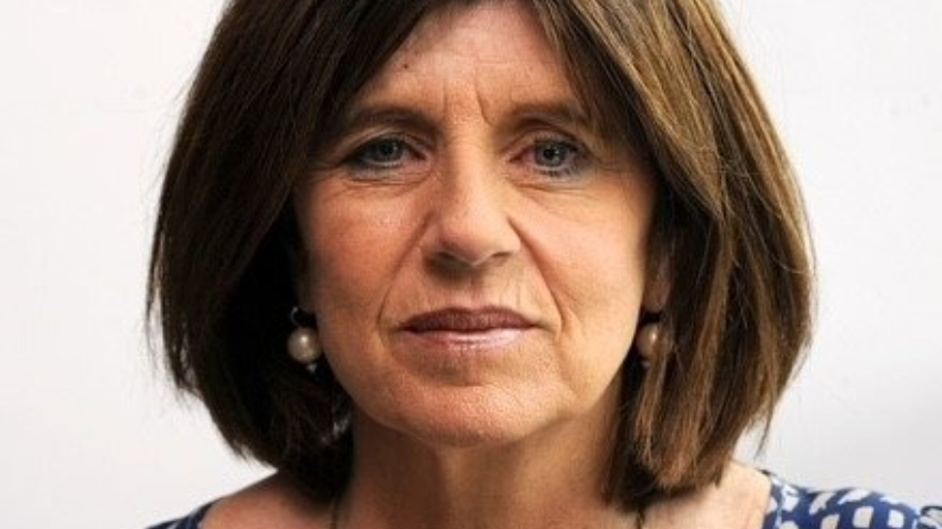 Close up image of Caroline Wilson against a white background