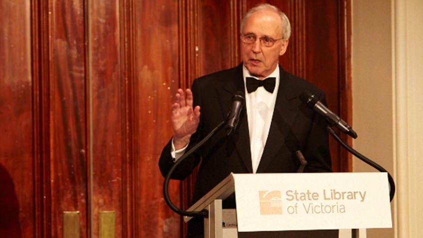 Former Prime Minister Paul Keating stands on a podium at State Library Victoria