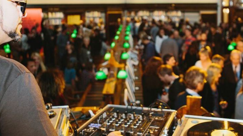 A Dj playing a set in the Library