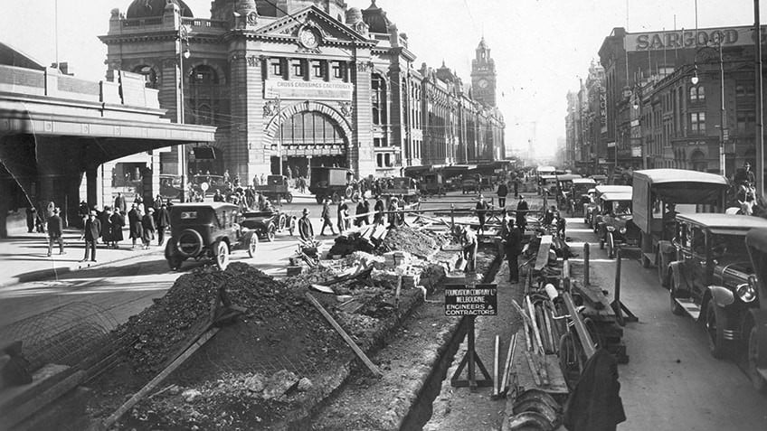 black and white photo of construction works outside Flinders Street station, Melbourne