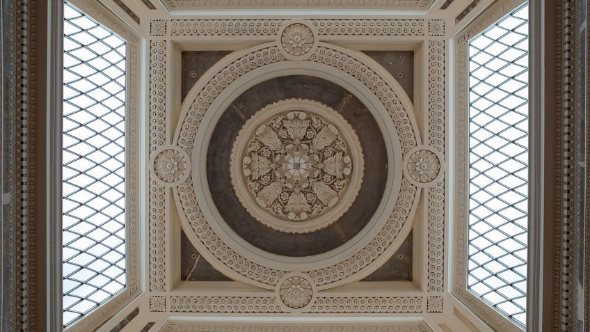 looking up to filligree skylights and coffered ceiling