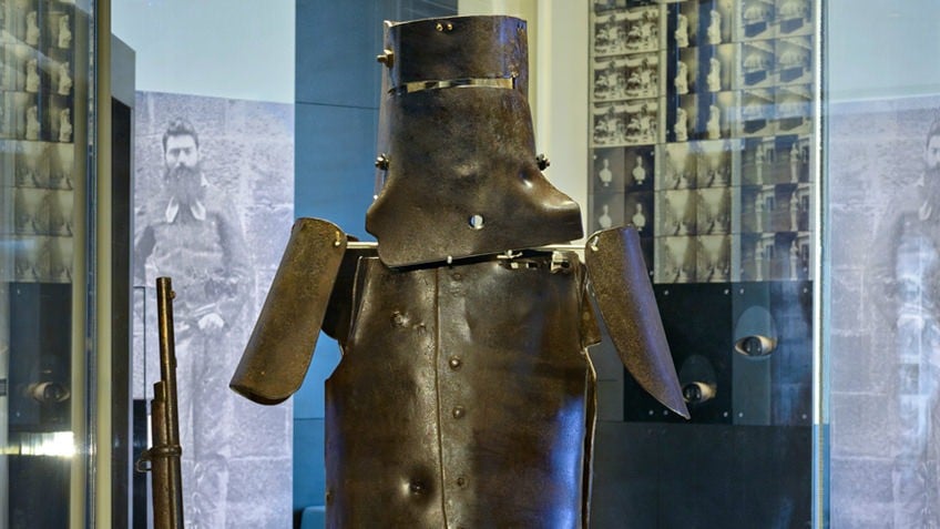 close-up of Ned Kelly armour in glass display case