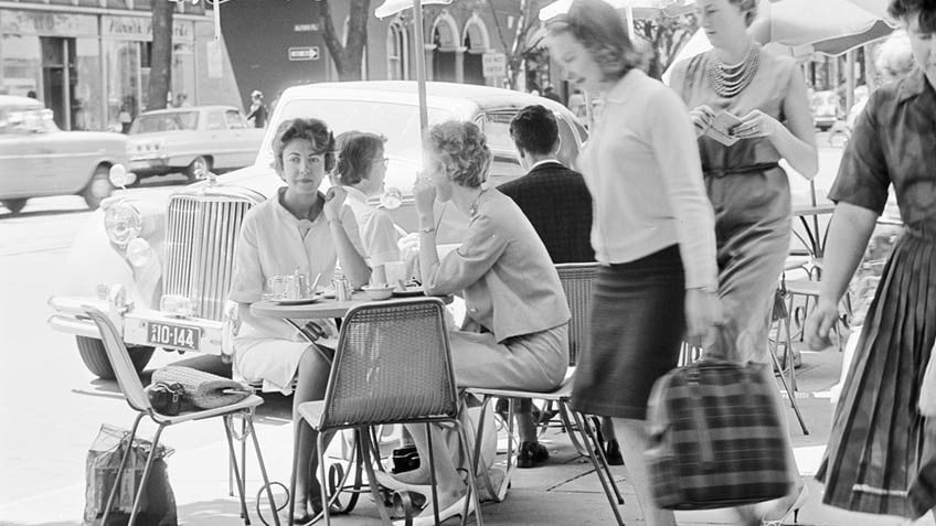 Mark Strizic. 1955. Two women sitting in a street cafe, Collins Street, between Russell and Exhibition Streets, Melbourne