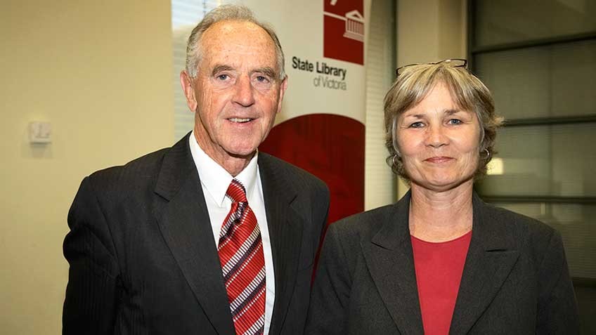 colour photo of 2006 Barrett Reid Scholarship recipient Anna Boland with the Hon John Cain, then president of the Library Board of Victoria