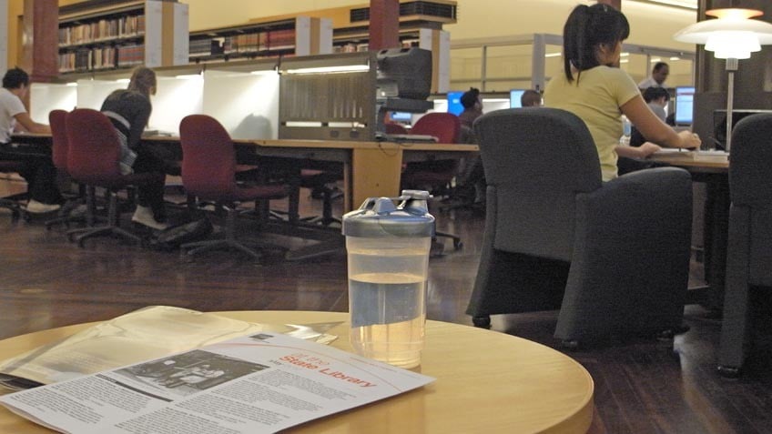 Water bottle on table in Redmond Barry Reading Room