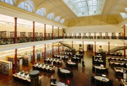 Redmond Barry Reading Room heritage reading room with mezzanine balconies, glass roof, shelves of books and study tables