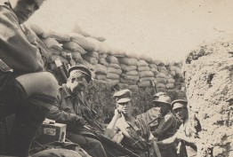 WWI frontline sepia photo of WWI soldiers in a trench