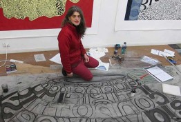 Photo of Angela Cavalieri, artist in studio, with work in progress Amore, 2013
