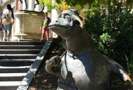 Colour photo of The Bunyip of Berkeley's Creek, Dromkeen sculpture, beside the front steps of State Library Victoria