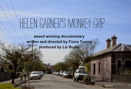 colour still from documentary about Helen Garner's Melbourne with inner-city backstreet with cars and terrace houses