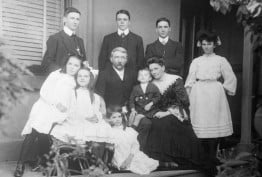 Black and white photographic portrait of an extended family