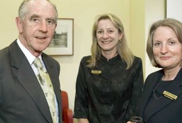 colour photo of 2006 Barrett Reid Scholarship recipients Lorraine Seeger and Bernardine Nolan with the Hon John Cain, then president of the Library Board of Victoria