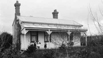Black and white photo of an old house