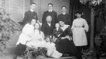 Black and white photographic portrait of an extended family