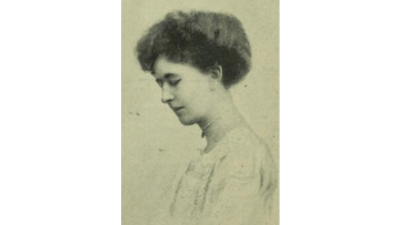 A sepia portrait of a woman in profile wearing a white dress