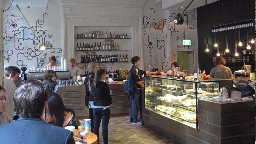 Colour photo of people queuing at the counter of the State Library Victoria cafe Mr Tulk by Andrew Marminc