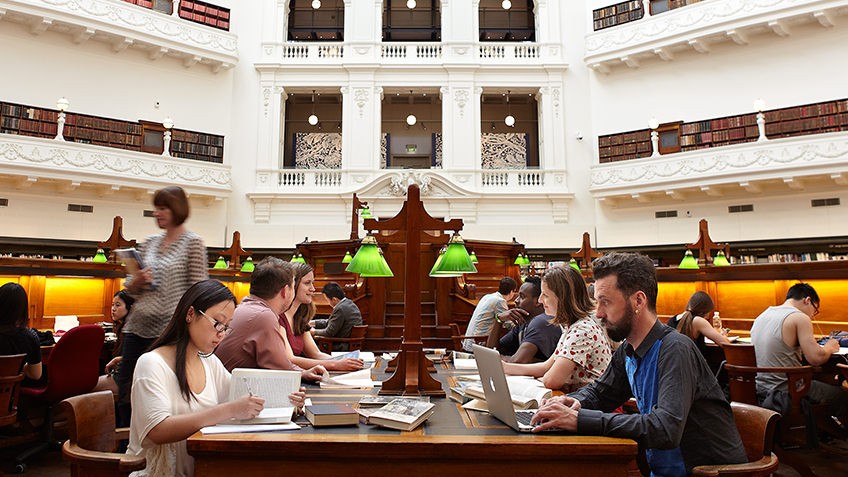 Photo of people sitting at desks in the dome