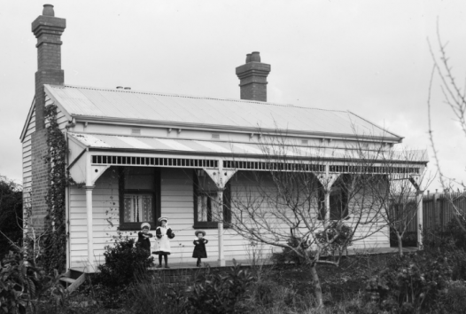 Black and white photo of an old house